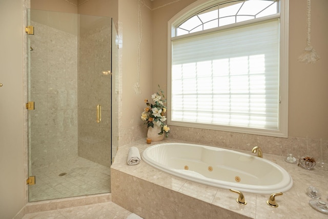 bathroom featuring tile patterned floors and plus walk in shower