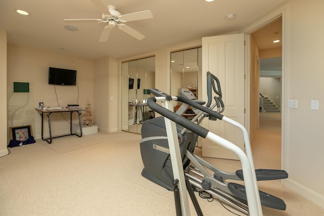 workout area featuring ceiling fan