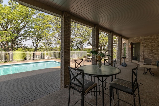 view of pool featuring a patio