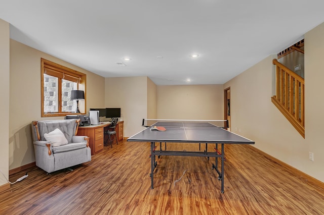 playroom with wood-type flooring