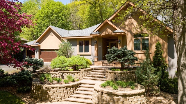 view of front of property featuring a garage