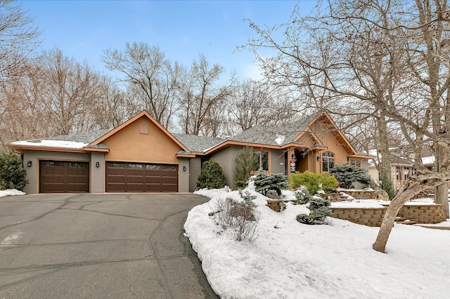 view of front of property featuring a garage