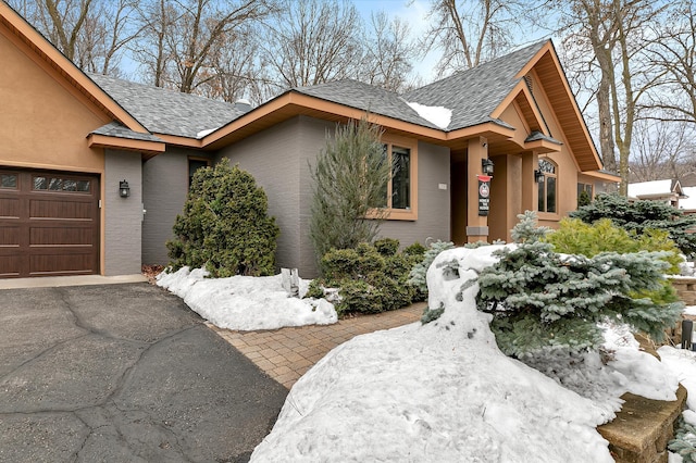 view of front of home featuring a garage