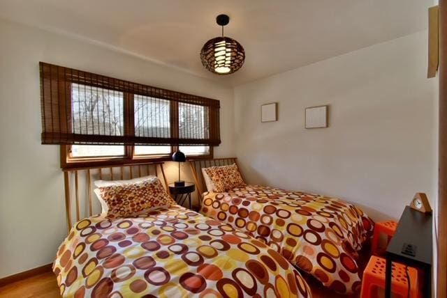 bedroom featuring hardwood / wood-style floors