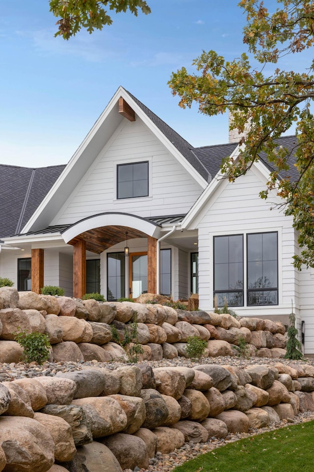 935 Lakewood Hills Rd, Eagan, MN 55123 - rear view of house with a shingled roof