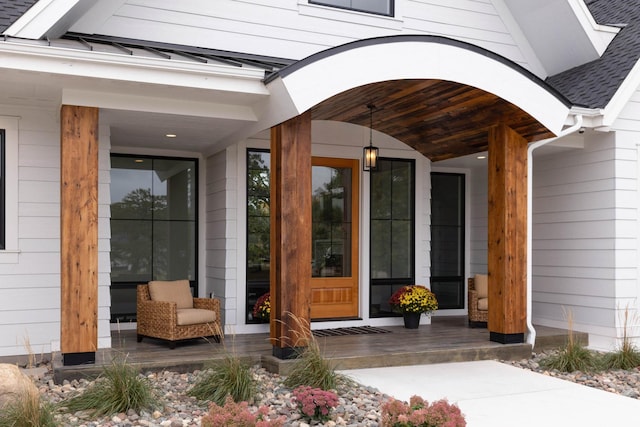 935 Lakewood Hills Rd, Eagan, MN 55123 - entrance to property featuring a porch and a shingled roof