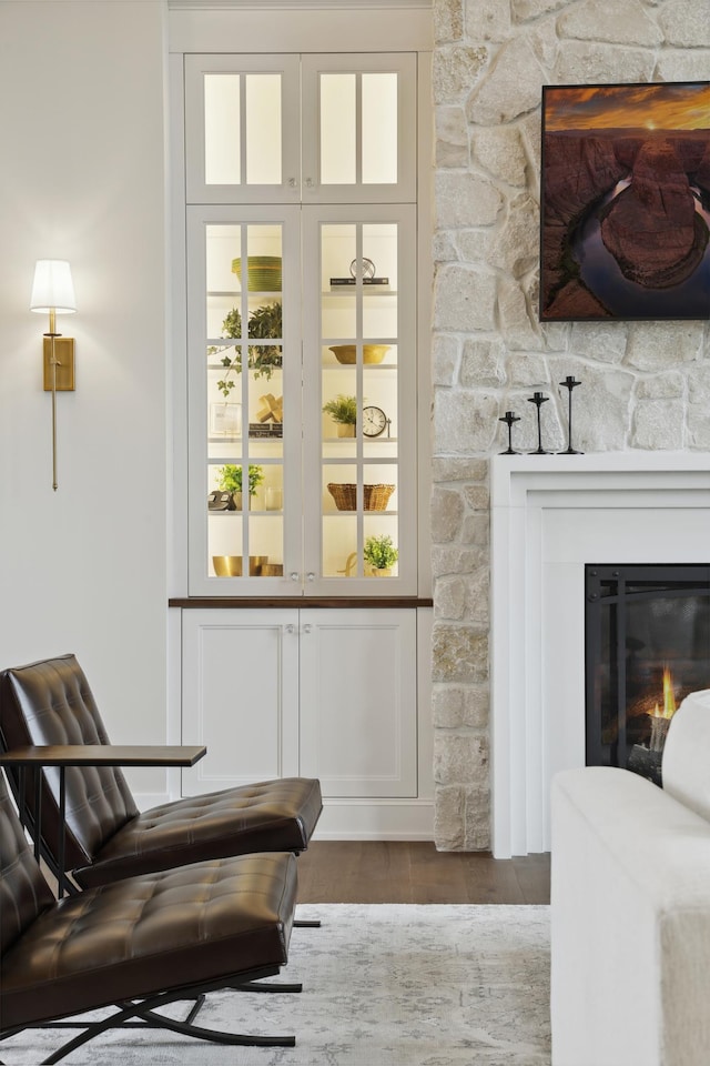 935 Lakewood Hills Rd, Eagan, MN 55123 - bar area with a glass covered fireplace and dark wood-style flooring