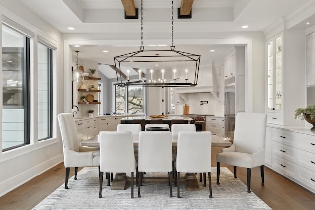 935 Lakewood Hills Rd, Eagan, MN 55123 - dining area with plenty of natural light, wood finished floors, recessed lighting, and a chandelier