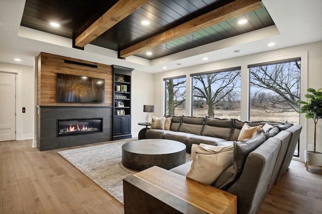 935 Lakewood Hills Rd, Eagan, MN 55123 - living room featuring a glass covered fireplace, wood finished floors, wooden ceiling, beam ceiling, and recessed lighting