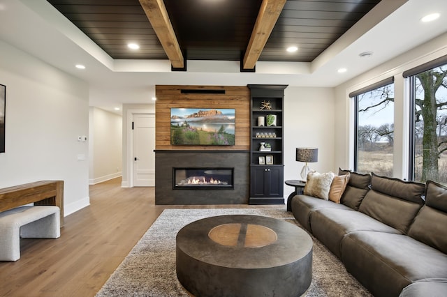 935 Lakewood Hills Rd, Eagan, MN 55123 - living area featuring light wood-style floors, wood ceiling, a large fireplace, baseboards, and recessed lighting