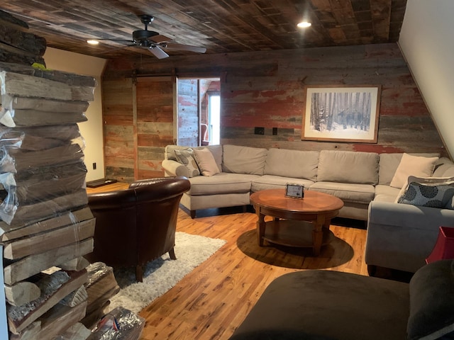 935 Lakewood Hills Rd, Eagan, MN 55123 - living room with wood walls, wood finished floors, a ceiling fan, and wooden ceiling
