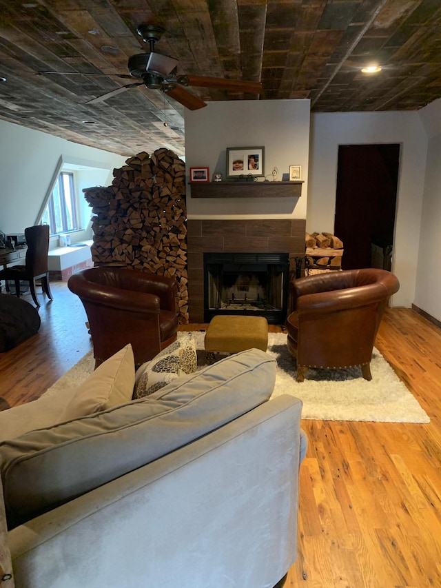 935 Lakewood Hills Rd, Eagan, MN 55123 - living room with ceiling fan, a fireplace, and wood finished floors