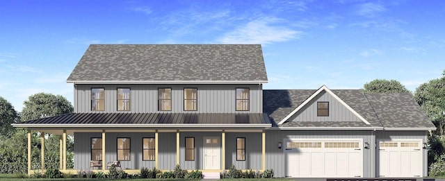 view of front of house with a garage and covered porch