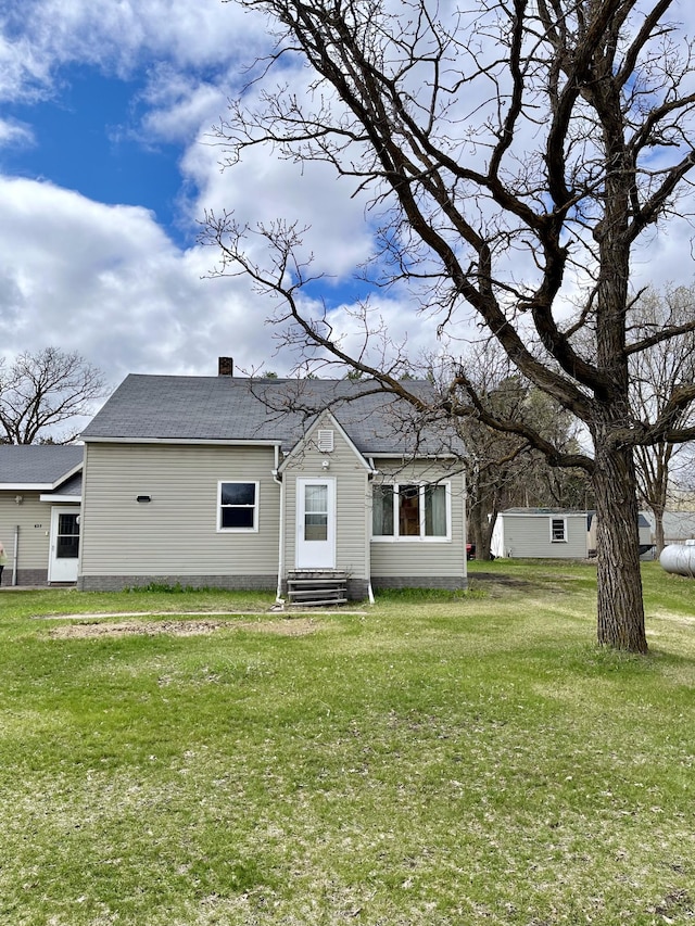 exterior space with a yard