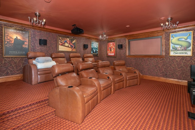 home theater room with dark carpet and a notable chandelier