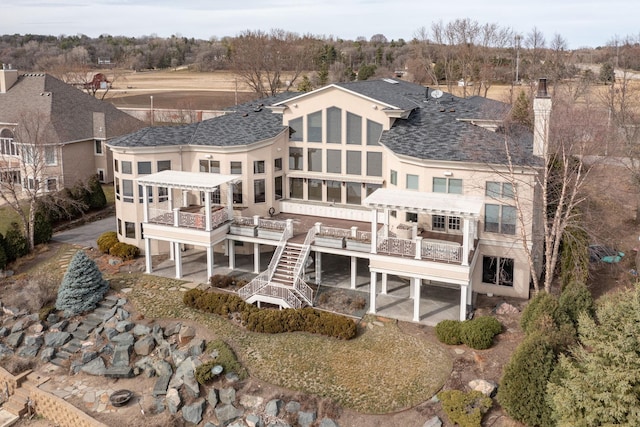 rear view of property with a patio area