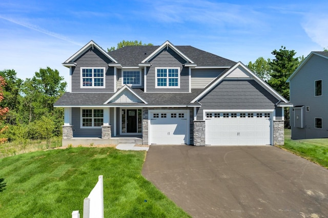 craftsman-style home with a front lawn