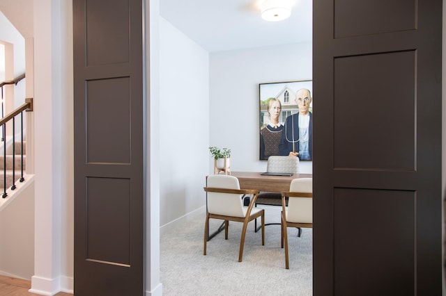 home office with light colored carpet