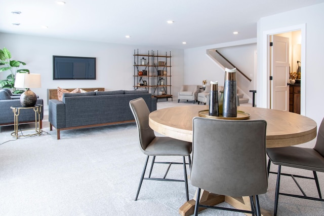 view of carpeted dining area