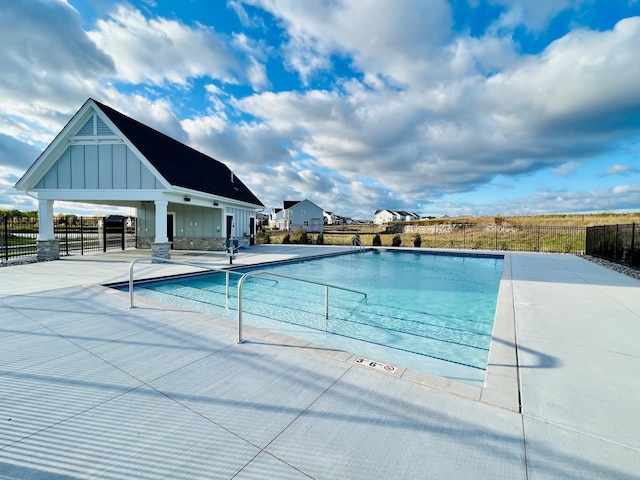 view of swimming pool featuring a gazebo and a patio