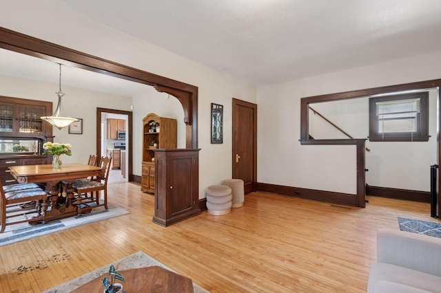 1503 Sheridan Ave N, Minneapolis, MN 55411 - living room featuring light wood-style flooring and baseboards