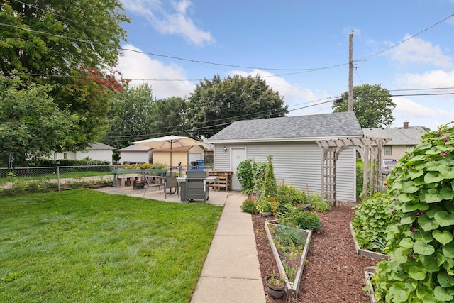 1503 Sheridan Ave N, Minneapolis, MN 55411 - view of yard featuring a patio, a pergola, and a vegetable garden