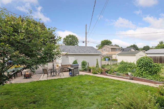 1503 Sheridan Ave N, Minneapolis, MN 55411 - view of yard with a patio area and a fire pit