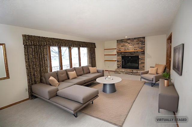 living room featuring hardwood / wood-style flooring and a fireplace