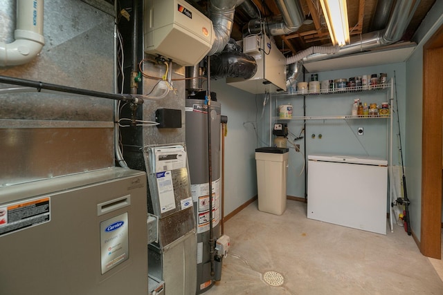 utility room featuring heating unit and water heater