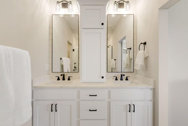 bathroom featuring double vanity