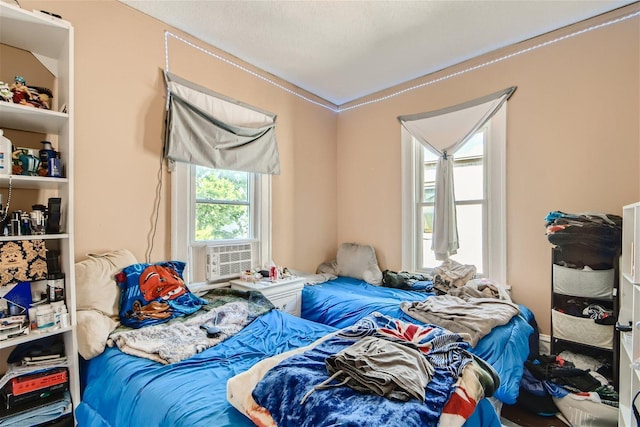 bedroom with crown molding