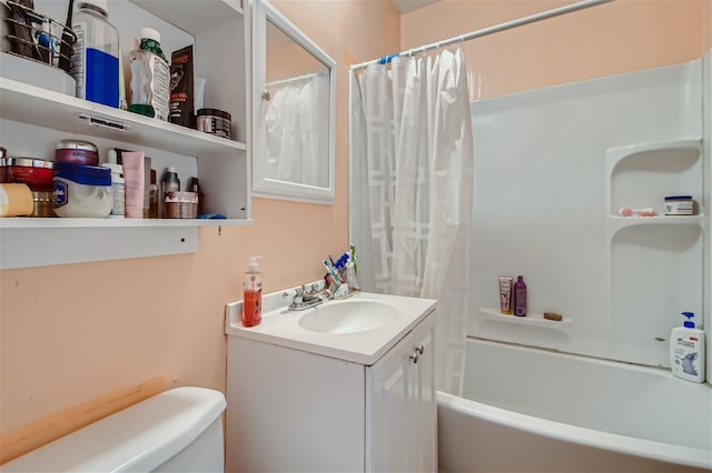 full bathroom featuring shower / tub combo, toilet, and vanity