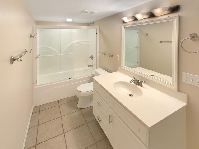 full bathroom with a textured ceiling, vanity, toilet, tile patterned floors, and washtub / shower combination