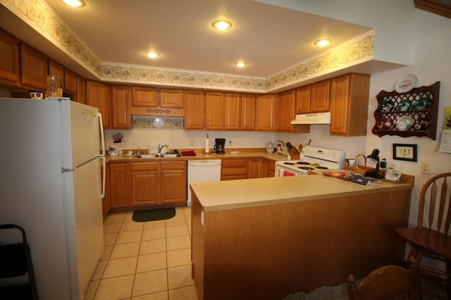 kitchen featuring white appliances, kitchen peninsula, light tile floors, and a textured ceiling