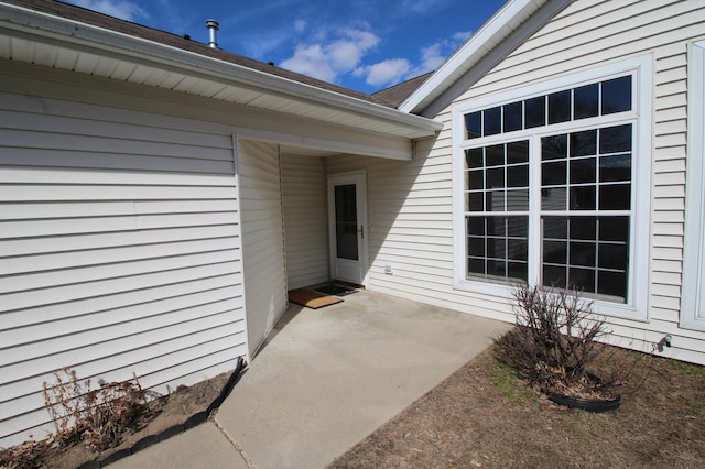 property entrance with a patio