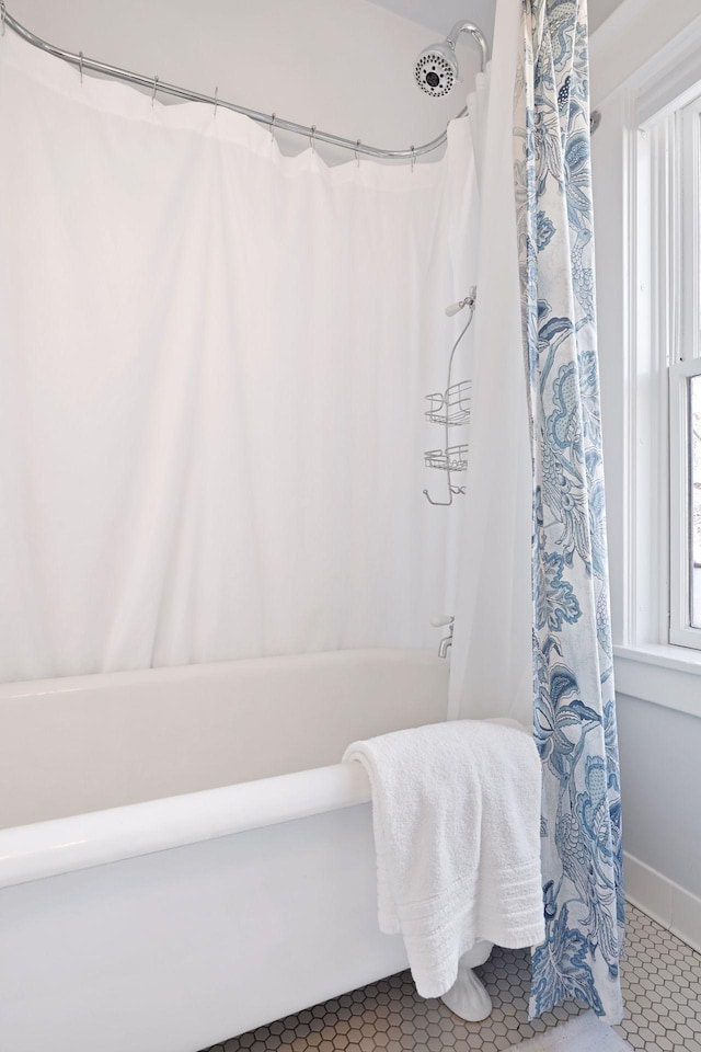 bathroom with tile patterned floors