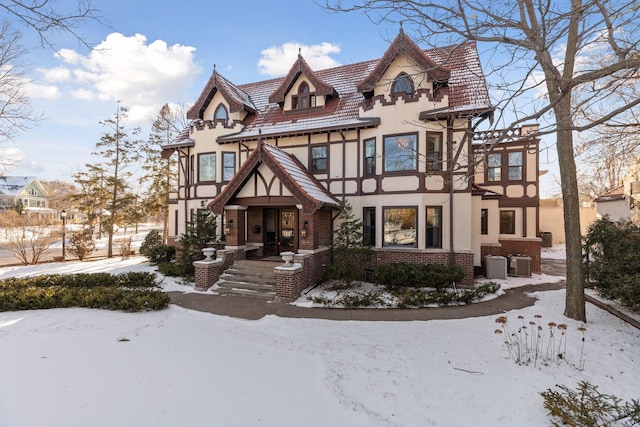 tudor home featuring central AC