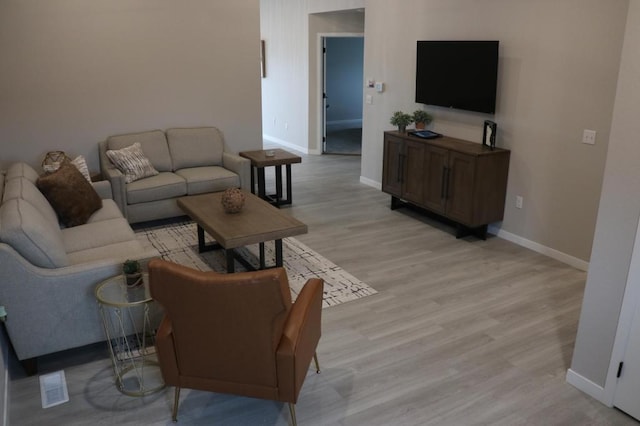 living room featuring light hardwood / wood-style floors