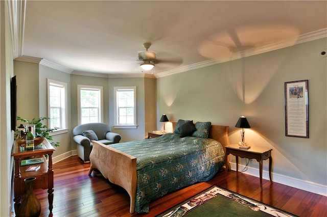 bedroom featuring ceiling fan, dark wood-type flooring, and ornamental molding