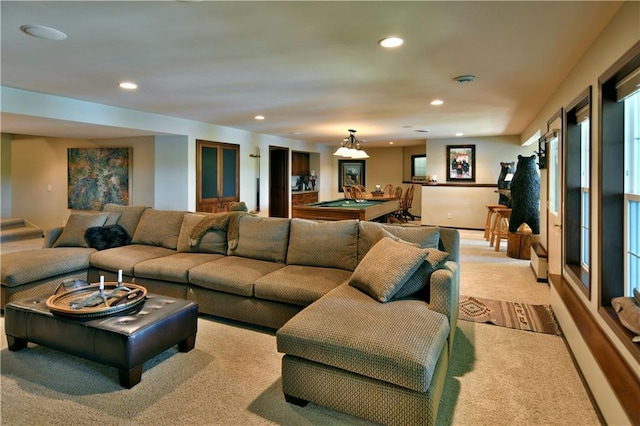 living room featuring light carpet and pool table