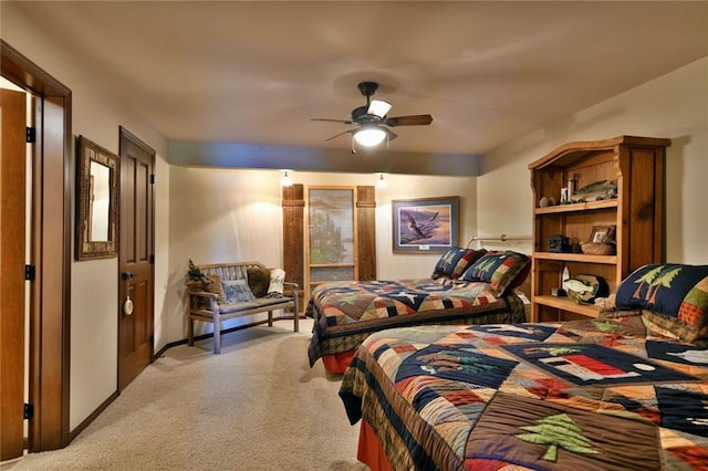 bedroom with ceiling fan and light colored carpet