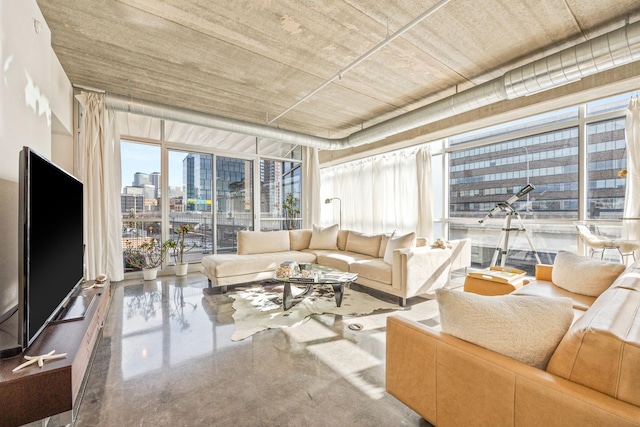 living room featuring concrete floors