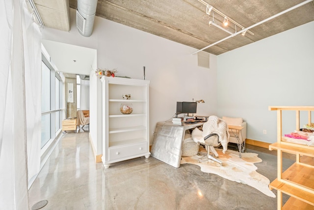 home office with concrete floors