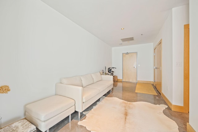 living room featuring concrete floors