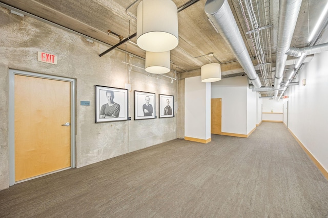 basement with hardwood / wood-style floors