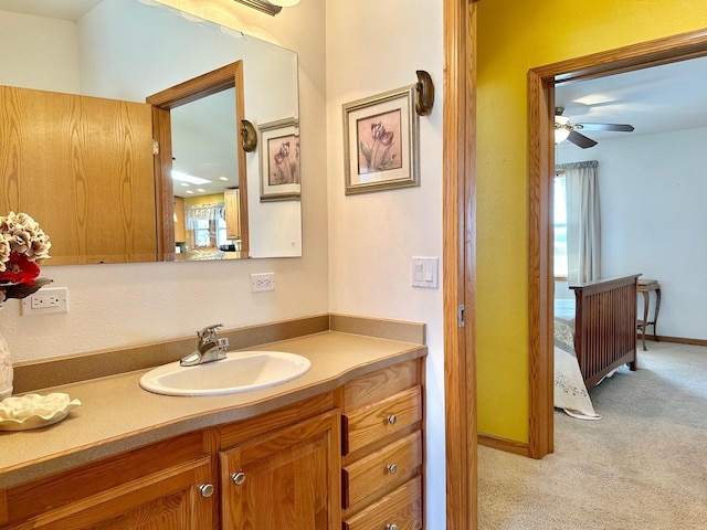 bathroom featuring vanity and ceiling fan