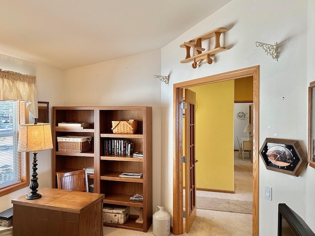 home office featuring light colored carpet