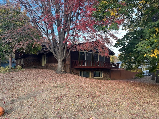 rear view of property with a deck