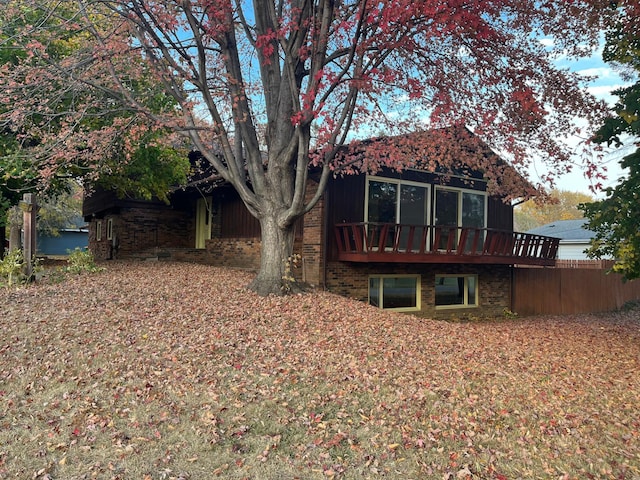 rear view of house with a deck