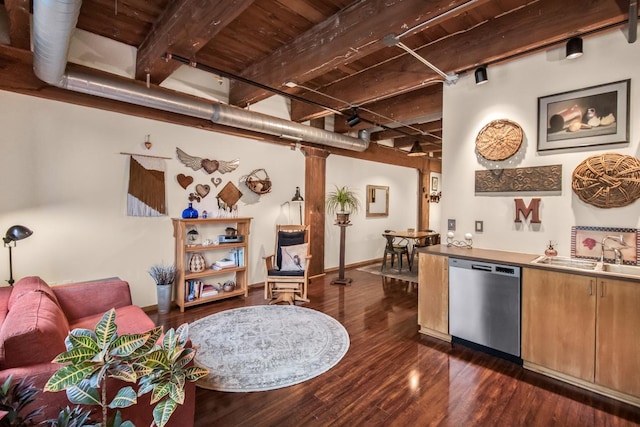 kitchen with beamed ceiling, dark hardwood / wood-style flooring, sink, wooden ceiling, and dishwashing machine